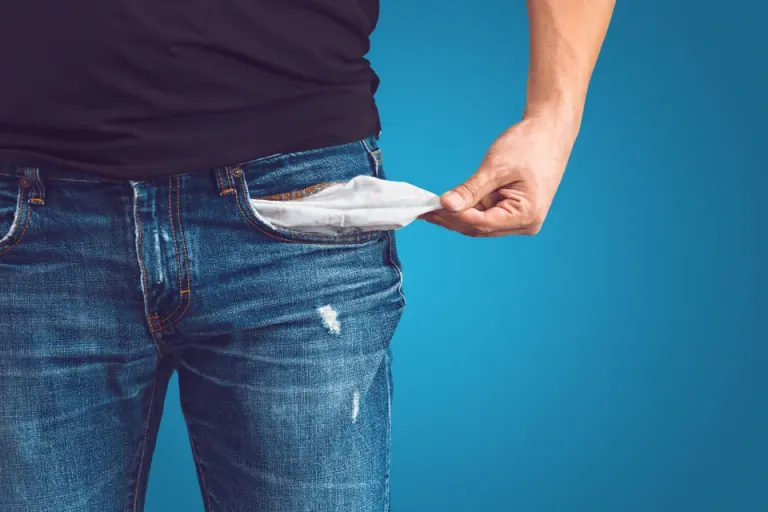 person with empty pockets