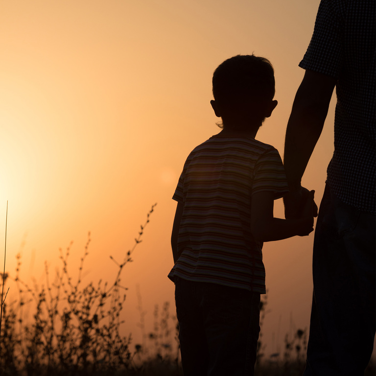 a man tracking his goals on a to do check list