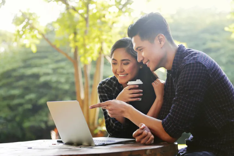 A small business owner confidently reviewing a clear financial dashboard, feeling in control of their business finances.