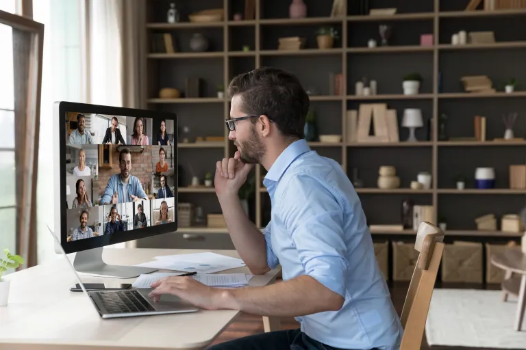 A business owner participates in a community group coaching call