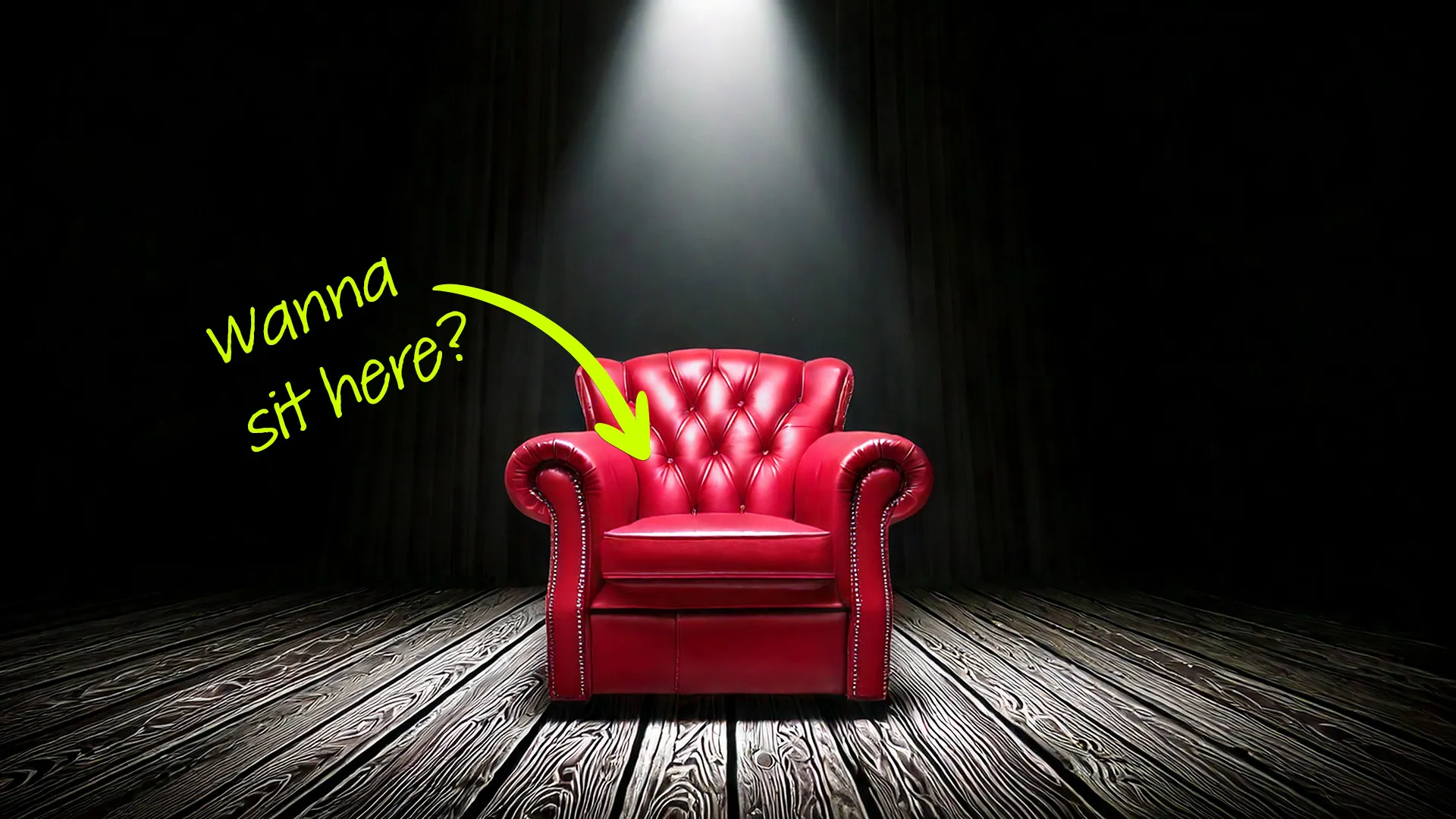 a red leather chair in the spotlight a dark room - volunteer to sit in the hot seat