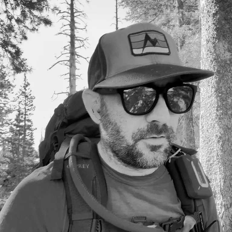 Zach Wise recording a dear sam issue while hiking in the mountains